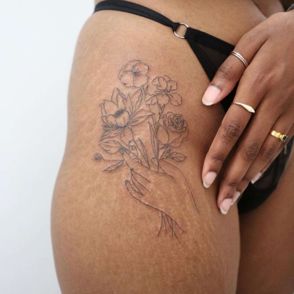 Considering a Fine Line Tattoo? Here's What to Know Before Getting One